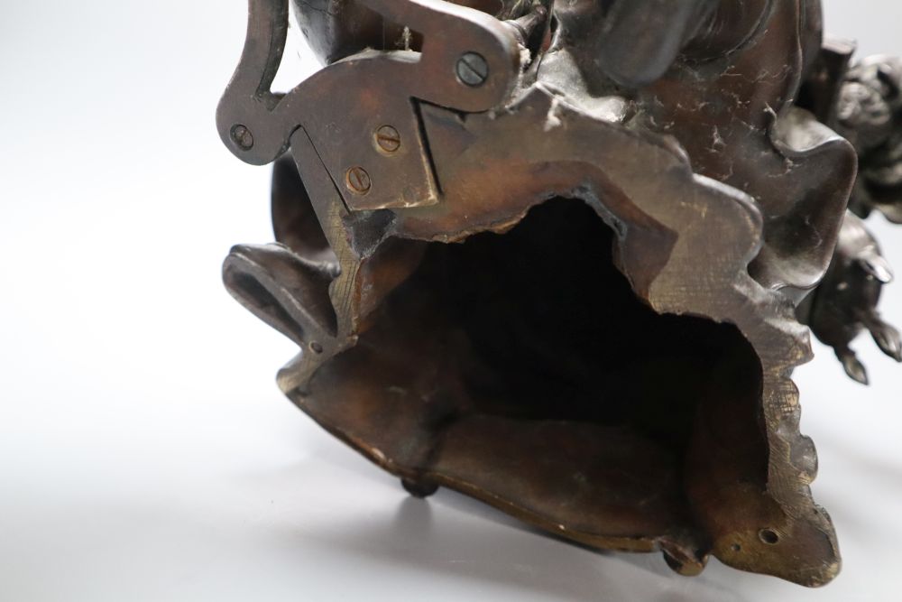 Jean Gout. A bronze model of a scholar painting to a globe, height 34cm